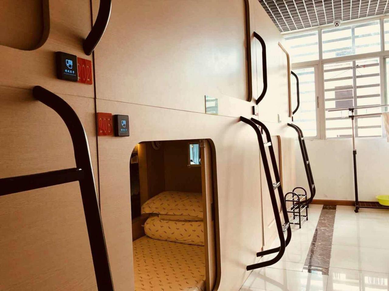 The Olive Tree Capsule Hostel Shenzhen Exterior photo
